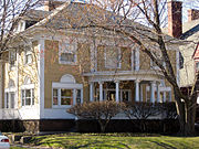 George Blossom House Corner View Through Trees.jpg